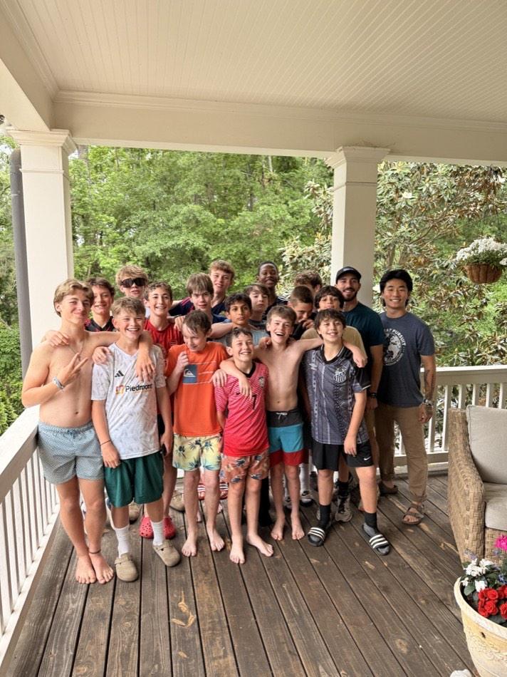 Ian with the middle school soccer team at Clarke